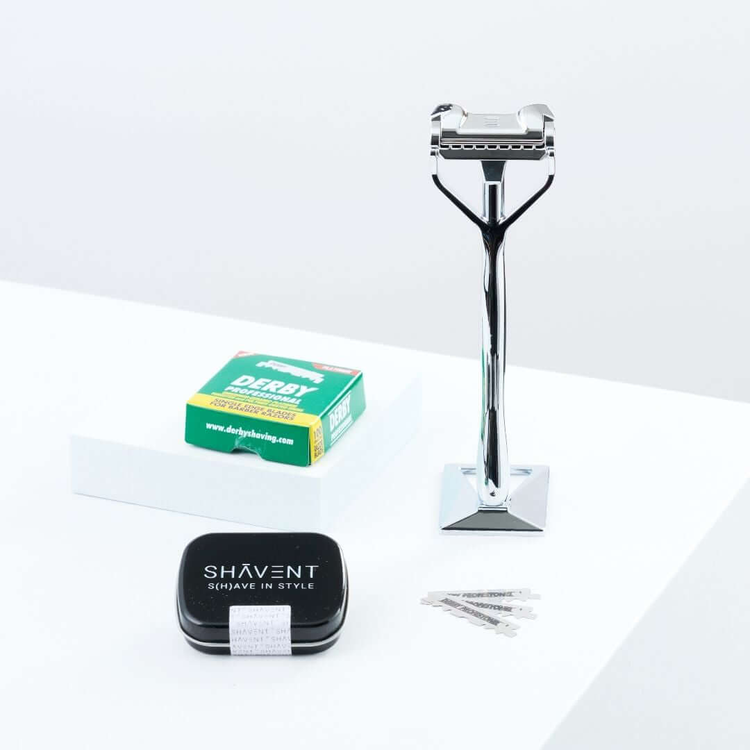 Rundum-Set: SHAVENT Original Schwingkopf-Rasierer, inklusive 100 Klingen und -sammeldose für plastikfreie, sanfte Rasur. Enthält Rasierer, Standfuß, Klingen und Aufbewahrungsdose.