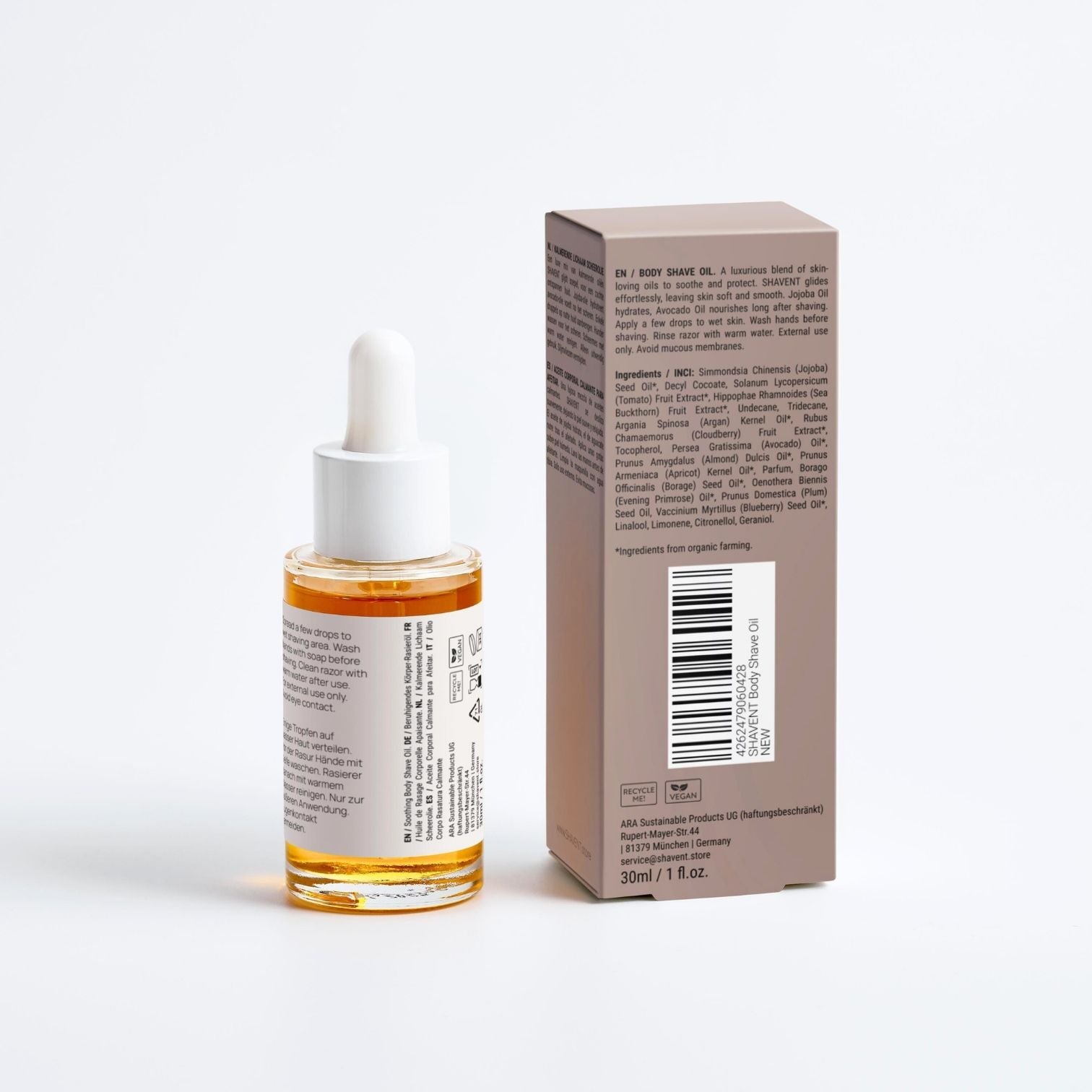 SHAVENT Soothing Body Shave Oil: 30 ml Glasflasche mit bernsteinfarbenem Öl und weißem Tropfer, beige Box mit veganen und recycelbaren Icons daneben.